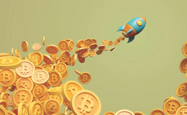 Rocket ship with bitcoin dropping out of the back, illustration
