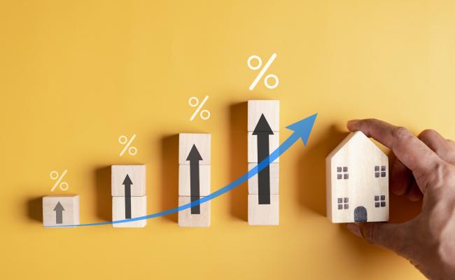 stock photo of increasing percentages with a small house